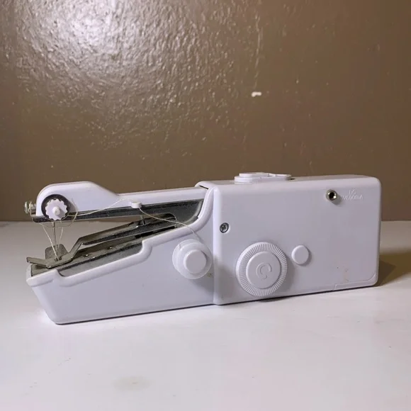 Compact White Handheld Sewing Machine - Picture 3 of 6